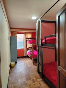 Ένα ή περισσότερα κρεβάτια σε δωμάτιο στο Yati Hostel