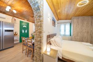 Kuchyň nebo kuchyňský kout v ubytování Paola Apartment Fiskardo