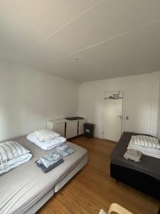 Postel nebo postele na pokoji v ubytování Grøn Odense Central + 4 fotografie