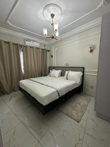 Katil atau katil-katil dalam bilik di Learn Life Private Residence