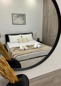 Postel nebo postele na pokoji v ubytování Korithis Apartment