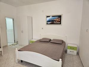 Postel nebo postele na pokoji v ubytování Aeria rooms Himare
