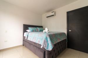 Postel nebo postele na pokoji v ubytování Casa Amplia, Piscina privada, Vía Samborondón, parrilla