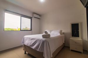 Postel nebo postele na pokoji v ubytování Casa Amplia, Piscina privada, Vía Samborondón, parrilla