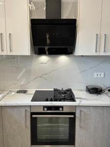 Kuchyň nebo kuchyňský kout v ubytování Korithis Apartment