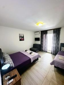 Postel nebo postele na pokoji v ubytování Guesthouse Civovic