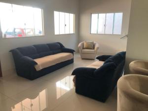 Istumisnurk majutusasutuses Suíte com janela para o jardim