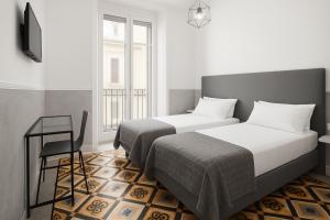 Postel nebo postele na pokoji v ubytování Toledostop + 49 fotografií