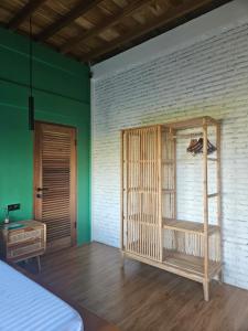 Postel nebo postele na pokoji v ubytování Mantra Yoga Homestay