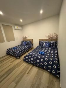 Postel nebo postele na pokoji v ubytování Parguera Beach Club & Hotel