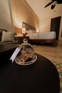 Postel nebo postele na pokoji v ubytování Kahal Hotel - Paseo Montejo