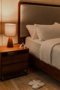 Postel nebo postele na pokoji v ubytování Kahal Hotel - Paseo Montejo