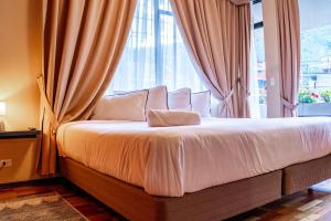 Postel nebo postele na pokoji v ubytování Hotel Casa Agave