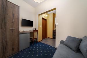 Telewizja i/lub zestaw kina domowego w obiekcie Willa Jaśkowy Dworek