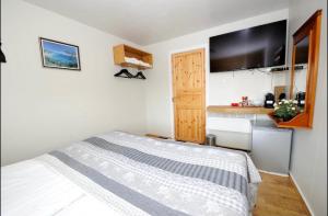 Rúm í herbergi á Dream Guesthouse