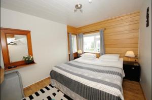 Rúm í herbergi á Dream Guesthouse