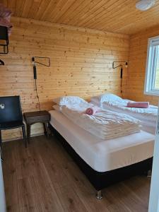 Postel nebo postele na pokoji v ubytování Starmýri 2 Cottages
