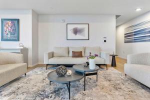 a living room with a couch and a table at MVR Luxury King Suite Overlooking Biscayne Bay in Miami +21 photos