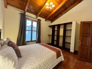 Ένα ή περισσότερα κρεβάτια σε δωμάτιο στο JAZ - Excellent location in Antigua, 4 guests