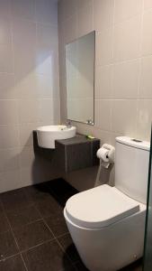Koupelna v ubytování Homestay FourSeasons @EVO MALL BANGI