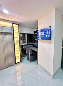 DauleにあるDep Titanium 3hab Squash Piscina Gym Cine Ofi-Roomのギャラリーの写真 +16枚の写真