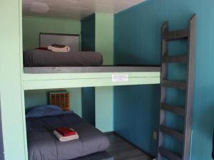 Postel nebo postele na pokoji v ubytování Seaside International Hostel