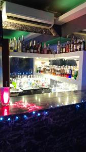 Lounge nebo bar v ubytování Auyama Bar