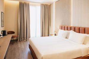 Postel nebo postele na pokoji v ubytování Grand Duka Hotel & SPA + 102 fotografií