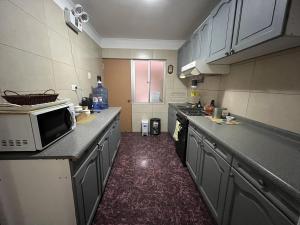 Kuchyň nebo kuchyňský kout v ubytování Hospedaje 2174