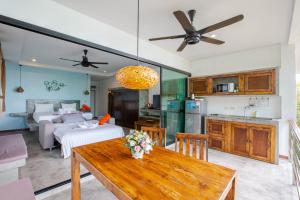 Voodi või voodid majutusasutuse Padel Phangan Suite toas