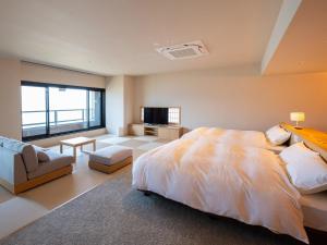 Ένα ή περισσότερα κρεβάτια σε δωμάτιο στο Suhaku