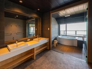 Ένα ή περισσότερα κρεβάτια σε δωμάτιο στο Suhaku