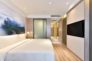 Letto o letti in una camera di Atour Hotel Beijing Yizhuang Mobile Silicon Valley