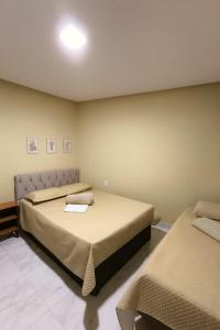 Postel nebo postele na pokoji v ubytování Apartamento inteiro Pé No Forró