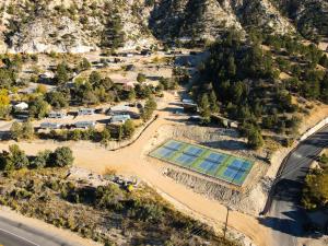 an aerial view of a tennis court next to a road at Airstream Adventure in Orderville