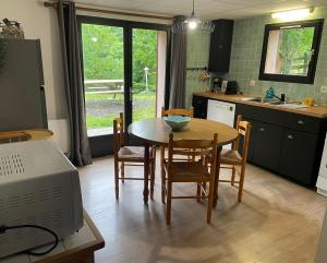 Kuchyňa alebo kuchynka v ubytovaní Appartement 4 personnes - CHALET COSY Mont Dore