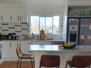 Cucina o angolo cottura di Otumoetai Shared Family Home - Sherwood Food Forest, New Zealand