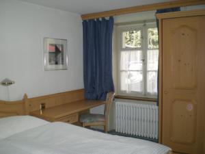 מיטה או מיטות בחדר ב-Hotel Danis