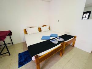 You Can Beach Resort Uppuveli 객실 침대
