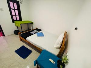 You Can Beach Resort Uppuveli 객실 침대