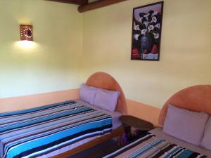 Postel nebo postele na pokoji v ubytování Hotel Las Salinas