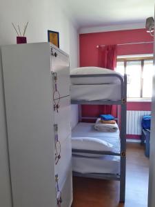 Ένα ή περισσότερα κρεβάτια σε δωμάτιο στο Valença Guesthouse