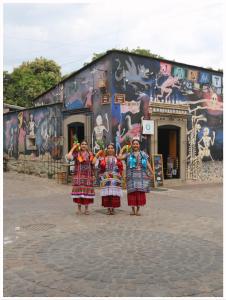 a group of people standing in front of a building at CASARU HOTEL OAXACA in Oaxaca City