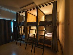 Ein Bett oder Betten in einem Zimmer der Unterkunft TIMN Hostel Female Only
