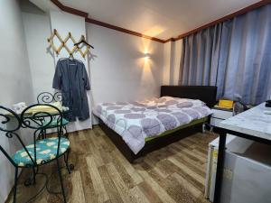 Postel nebo postele na pokoji v ubytování Buil Motel