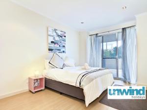 Katil atau katil-katil dalam bilik di Block Escape - Ocean View Apartment No 1
