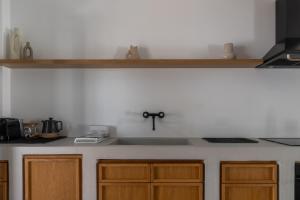A kitchen or kitchenette at Siora of Paros - Ammiralis & Castelis