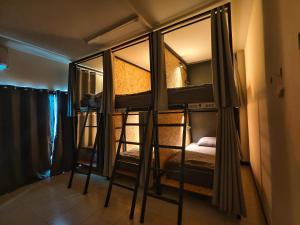 Ein Bett oder Betten in einem Zimmer der Unterkunft TIMN Hostel Female Only