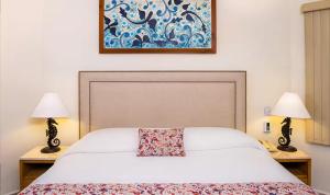 Ένα ή περισσότερα κρεβάτια σε δωμάτιο στο Villa del Palmar Los Cabos, Elite Luxe Member Units by Stephen Ostler