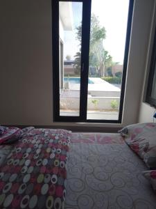 Postel nebo postele na pokoji v ubytování The GetAway + 6 fotografií